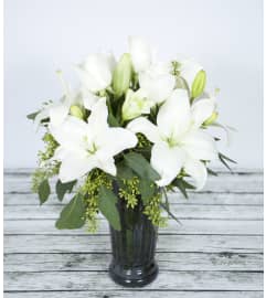 Lily White. An arrangement by Massey's House of Flowers.