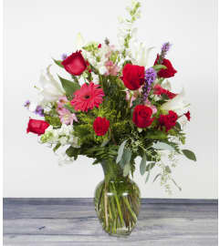 Bursting With Color. An arrangement by Alexa's Flowers.