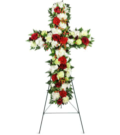 Love and Prayers Sympathy Cross™. An arrangement by Abundant Flowers and Gift Shoppe.