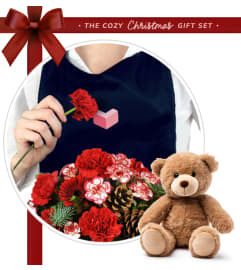 Very Merry Bouquet and Teddy Bear Bundle. An arrangement by Marianne's Floral Garden.