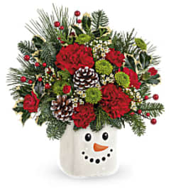 Teleflora's Festive Frosty Bouquet. An arrangement by Dowling Flowers.