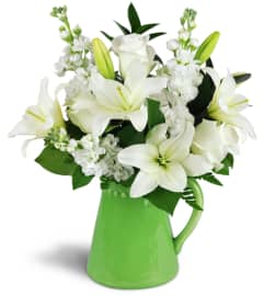 Pitcher of Serenity™. An arrangement by Hialeah Flowers.