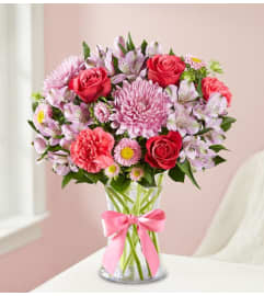 Sweetheart Medley™. An arrangement by Garden of Eden Floral.