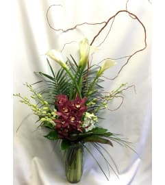 Orchid Fest. An arrangement by Blue Iris Florist.