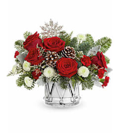 The Teleflora's Little Drummer Joy Bouquet. An arrangement by Marivel's Florist and Gifts.