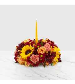 FTD's Giving Thanks Candle ™Centerpiece. An arrangement by Mardi Gras Florist.