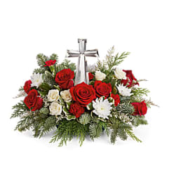 A Teleflora's Joy of Light Bouquet. An arrangement by Marivel's Florist and Gifts.