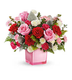 The Teleflora's Tranquil Love Bouquet. An arrangement by Marivel's Florist and Gifts.