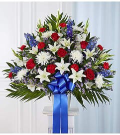 Heartfelt Sympathies™ Red, White, and Blue Standing Basket. An arrangement by Blessing and Blooms Florist.