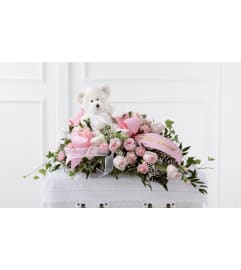 The FTD® Touch of Sympathy™ Casket Spray. An arrangement by Syd Kemsley Florist.