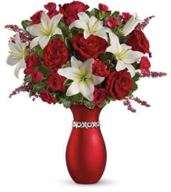 Teleflora's XOXO Bouquet with Red Roses. An arrangement by Devine Orchid.