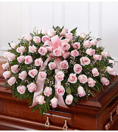 Pink Rose Half Casket Cover. An arrangement by Blessing and Blooms Florist.