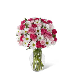 The FTD® Sweet Surprises® Bouquet. An arrangement by Cal's Grower Direct.