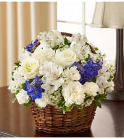 Peace, Prayers and Blessings - Blue and White. An arrangement by Graceland Florist.