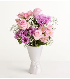 The Pastel Garden™. An arrangement by Flowers of Jacksonville. The Pastel Garden™. An arrangement by Flowers of Jacksonville.