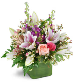 May Flowers. An arrangement by Abundant Flowers and Gift Shoppe.