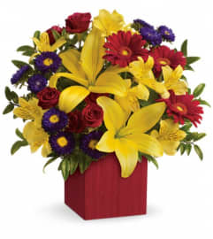 Teleflora's Summer Brights. An arrangement by Fabulous Flowers.