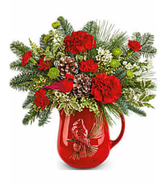 The Teleflora's Festive Flight Bouquet. An arrangement by Marivel's Florist and Gifts.