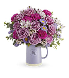 The Sweetest Flutter Bouquet. An arrangement by Marivel's Florist and Gifts.