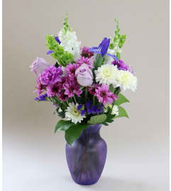 By Twilight's Shine. An arrangement by Midtown Florist.