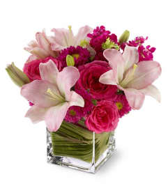 Teleflora's Posh Pinks. An arrangement by Florist of the Northwoods.