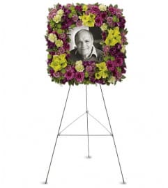 Mosaic of Memories Square Easel Wreath. An arrangement by Wasaga Flowers.