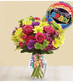It’s Your Day Bouquet® Graduation. An arrangement by Lovingly Charlotte.