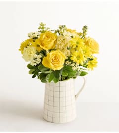 The Sunshine Radiance™ Bouquet. An arrangement by Flowers of Jacksonville.
