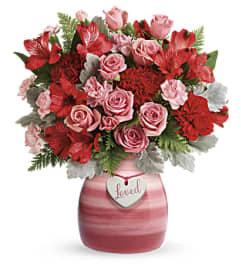 Teleflora's Playfully Pink Arrangement. An arrangement by Artistic Way Flowers.