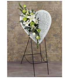 WHITE HEART W/EASEL. An arrangement by Sicola's Florist.