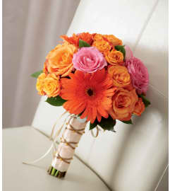 The FTD® New Sunrise™ Wedding Bouquet. An arrangement by Mystic Garden Floral.
