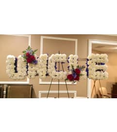 Floral Letter Designs. An arrangement by Violeta's Flower Shop.