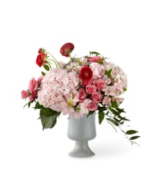 The FTD® Swooning™ Bouquet. An arrangement by Eve's Baskets and More LLC.