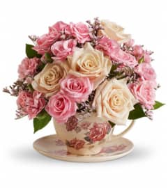 Teleflora's Victorian Teacup Bouquet. An arrangement by Vivian Flowers.