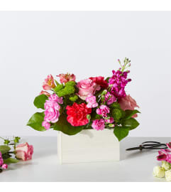 A Sweetberry Box – A Florist Original. An arrangement by Country Cousins Flower Shop.