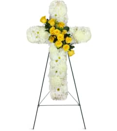 His Promise Cross Spray™. An arrangement by Abundant Flowers and Gift Shoppe.