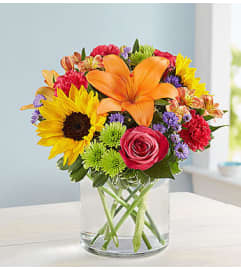 Floral Embrace™. An arrangement by Blessing and Blooms Florist.