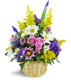 Ode to Springtime Basket™. An arrangement by Vemongi Flowers.