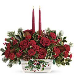 Teleflora's Holly Glow Centerpiece. An arrangement by Pompano Beach Floral.