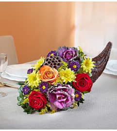 Fresh Flower Cornucopia. An arrangement by Blessing and Blooms Florist.
