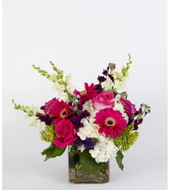 A Little Something Sweet. An arrangement by Masters and Company Florist.