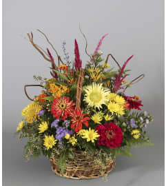 Brimming Basket of Joy. An arrangement by Country Arts In Flowers.