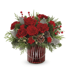 Teleflora's Merry Glow Bouquet. An arrangement by Vivian Flowers.