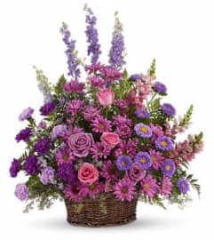 Lavender Basket Tribute. An arrangement by Vaillant Florist.