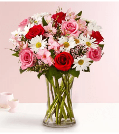 Budding Romance™. An arrangement by Graceland Florist. Budding Romance™. An arrangement by Graceland Florist.