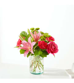 A Watermelon Crush Bouquet. An arrangement by Country Cousins Flower Shop.