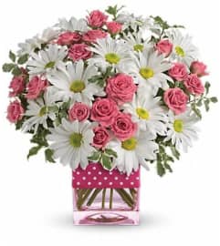 Teleflora's Polka Dots and Posies. An arrangement by Devine Orchid.