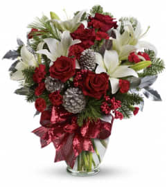 Holiday Enchantment Bouquet. An arrangement by Wasaga Flowers.