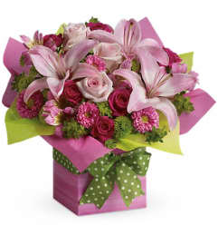 Teleflora's Pretty Pink Present. An arrangement by Fabulous Flowers.