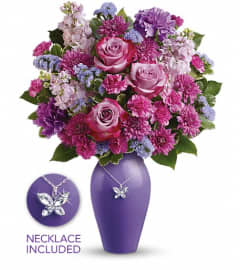Teleflora's Roses And Butterflies Bouquet. An arrangement by Devine Orchid.